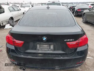 2015 BMW 4 Series 428i with VIN WBA4A9C54FD416870, listed as a IAAI auction lot 41593977 with 99,314 mi miles and . Bid and sale history available at DreamBid. Image 16.