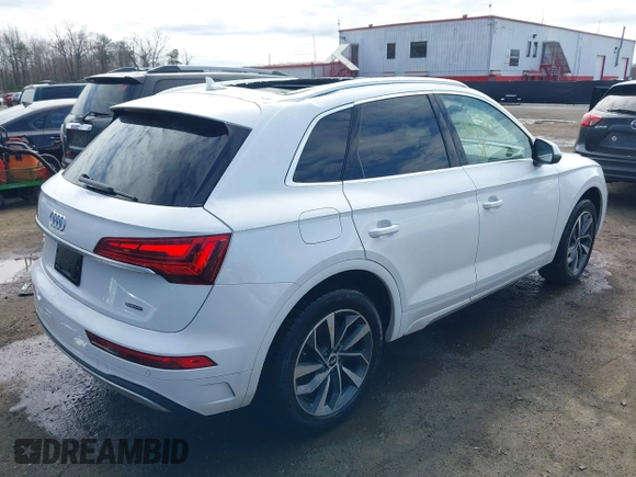 2021 Audi Q5 Premium Plus with VIN WA1BAAFY5M2010794, listed as a IAAI auction lot 41697512 with 51,732 mi miles and . Bid and sale history available at DreamBid. Image 4.