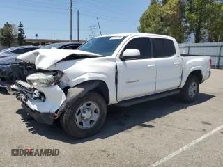 2018 Toyota Tacoma SR with VIN 5TFAX5GNXJX126244, listed as a Copart auction lot 57715405 with 63,896 mi miles and Salvage title. Bid and sale history available at DreamBid. Image 1.