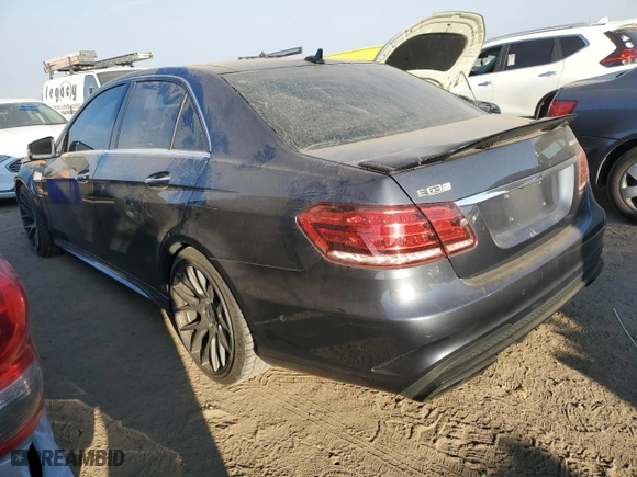 2014 Mercedes-Benz E-Class E 63 AMG S-Model with VIN WDDHF7GB3EA983149, listed as a Copart auction lot 74543274 with 86,410 mi miles and Salvage Title. Bid and sale history available at carsss.com. Image 2.