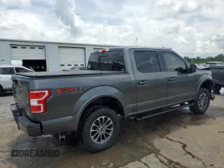2018 Ford F-150 XL with VIN 1FTEW1EG7JFC40015, listed as a Copart auction lot 60659755 with 194,645 mi miles and Salvage title. Bid and sale history available at DreamBid. Image 3.