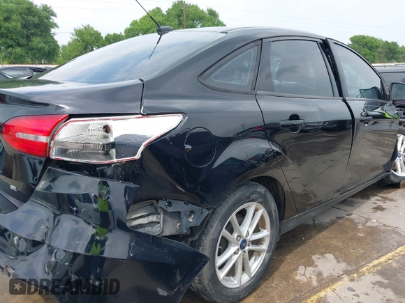 2018 Ford Focus SE with VIN 1FADP3F22JL311975, listed as a IAAI auction lot 41934856 with 68,974 mi miles. Bid and sale history available at carsss.com. Image 21.