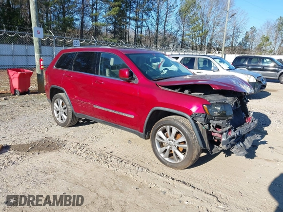 2013 Jeep Grand Cherokee Laredo with VIN 1C4RJEAG3DC631987, listed as a IAAI auction lot 41240182 with 186,193 mi miles. Bid and sale history available at carsss.com. Image 1.