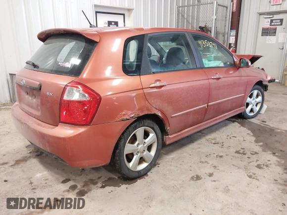 2007 Kia Spectra with VIN KNAFE162575000628, listed as a IAAI auction lot 41353741 with 152,693 mi miles. Bid and sale history available at carsss.com. Image 4.