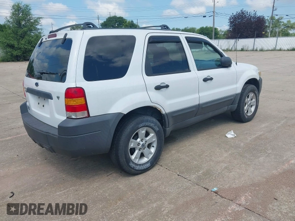 2006 Ford Escape XLT z VIN 1FMCU03106KA68555, wystawiony jako IAAI lot #42639823 z przebiegiem 147 320 mil mil oraz . Historia ofert i sprzedaży dostępna na DreamBid. Obrazek 4.