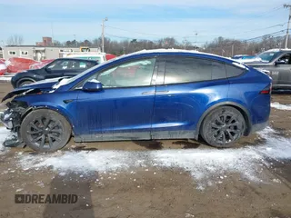 2022 Tesla Model X Plaid z VIN 7SAXCBE69NF343318, wystawiony jako IAAI lot #41387403 z przebiegiem Nie podano mil oraz . Historia ofert i sprzedaży dostępna na DreamBid. Obrazek 14.