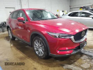 2020 Mazda CX-5 Grand Touring with VIN JM3KFBDM2L1771632, listed as a Copart auction lot 52894945 with 34,926 mi miles and Salvage Title. Bid and sale history available at carsss.com. Image 4.