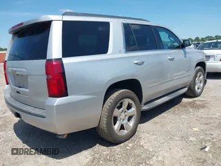 2015 Chevrolet Tahoe LT with VIN 1GNSCBKC9FR223426, listed as a IAAI auction lot 42352698 with 128,339 mi miles and . Bid and sale history available at DreamBid. Image 4.