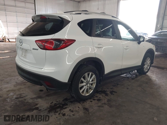 2014 Mazda CX-5 Touring with VIN JM3KE4CY4E0321055, listed as a IAAI auction lot 41613593 with 174,339 mi miles. Bid and sale history available at carsss.com. Image 4.