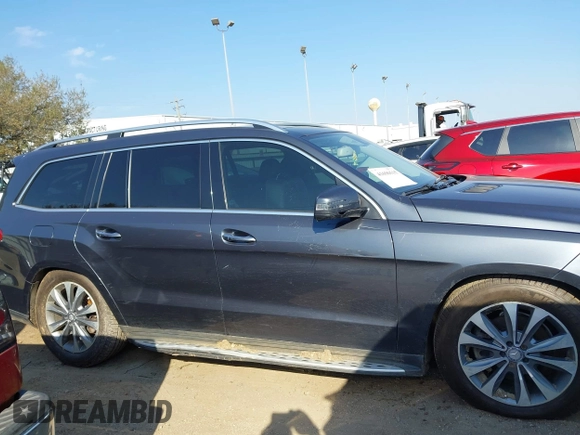 2016 Mercedes-Benz GL with VIN 4JGDF6EE0GA703783, listed as a IAAI auction lot 41696515 with 146,679 mi miles. Bid and sale history available at carsss.com. Image 13.