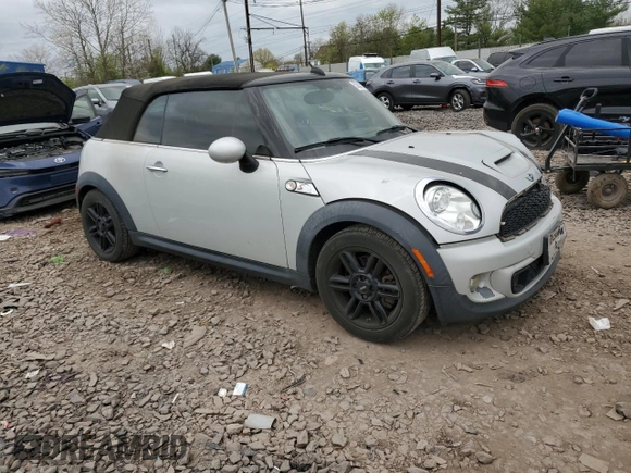 2015 MINI Convertible S with VIN WMWZP3C57F2A91437, listed as a Copart auction lot 53883525 with 28,185 mi miles and Salvage title. Bid and sale history available at DreamBid. Image 4.