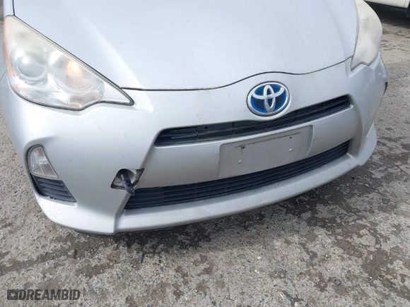 2013 Toyota Prius c One with VIN JTDKDTB32D1035449, listed as a IAAI auction lot 41799633 with 132,518 mi miles. Bid and sale history available at carsss.com. Image 6.