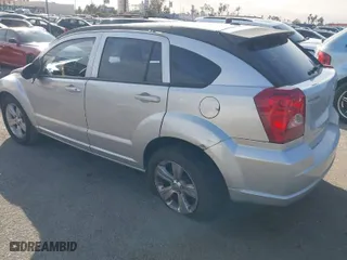 2010 Dodge Caliber SXT with VIN 1B3CB4HA3AD664526, listed as a IAAI auction lot 41401694 with 215,104 mi miles. Bid and sale history available at carsss.com. Image 3.