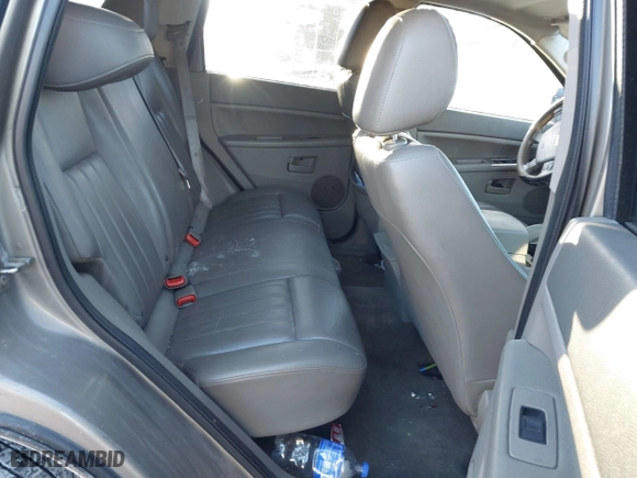 2005 Jeep Grand Cherokee Laredo with VIN 1J4HR48N55C561732, listed as a IAAI auction lot 41349373 with 185,920 mi miles. Bid and sale history available at carsss.com. Image 8.