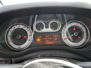 2014 FIAT 500L Trekking z VIN ZFBCFADH9EZ006421, wystawiony jako Copart lot #52418365 z przebiegiem 112 740 mil mil oraz Szkody całkowita. Historia ofert i sprzedaży dostępna na DreamBid. Obrazek 9.
