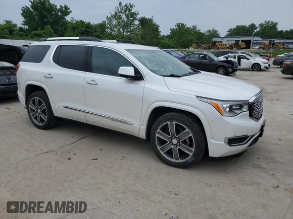 2017 GMC Acadia Denali with VIN 1GKKNXLS1HZ148329, listed as a Copart auction lot 59635205 with 123,298 mi miles and Salvage title. Bid and sale history available at DreamBid. Image 4.