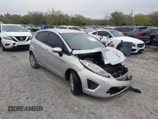 2013 Ford Fiesta SE with VIN 3FADP4EJ6DM107293, listed as a IAAI auction lot 41898229 with 129,694 mi miles. Bid and sale history available at carsss.com. Image 1.