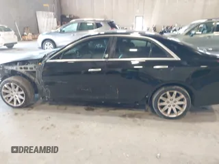 2014 Cadillac CTS Luxury AWD with VIN 1G6AX5S31E0143179, listed as a IAAI auction lot 41421639 with 135,810 mi miles and . Bid and sale history available at DreamBid. Image 14.
