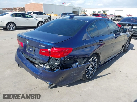 2019 BMW 5 Series 540i with VIN WBAJE5C56KG919325, listed as a IAAI auction lot 41712632 with 71,413 mi miles and . Bid and sale history available at DreamBid. Image 4.
