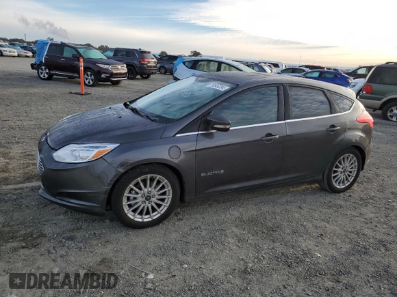 2015 Ford Focus Electric with VIN 1FADP3R43FL221870, listed as a Copart auction lot 79549284 with 67,079 mi miles and Salvage title. Bid and sale history available at DreamBid. Image 1.