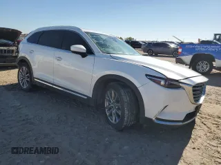 2019 Mazda CX-9 Grand Touring with VIN JM3TCADY0K0326045, listed as a Copart auction lot 83838054 with 125,308 mi miles and Salvage Title. Bid and sale history available at carsss.com. Image 4.