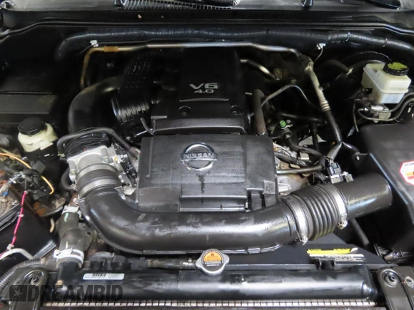 2014 Nissan Frontier SV with VIN 1N6AD0ERXEN763554, listed as a Copart auction lot 64313295 with 109,756 mi miles and Salvage title. Bid and sale history available at DreamBid. Image 7.