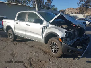 2019 Ford Ranger XL with VIN 1FTER4EH8KLA13386, listed as a IAAI auction lot 41382182 with 104,987 mi miles. Bid and sale history available at carsss.com. Image 1.
