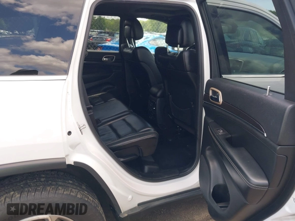2014 Jeep Grand Cherokee Limited with VIN 1C4RJFBG3EC350648, listed as a IAAI auction lot 42523221 with 125,447 mi miles and . Bid and sale history available at DreamBid. Image 8.