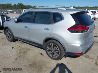 2019 Nissan Rogue SV with VIN JN8AT2MT9KW263300, listed as a IAAI auction lot 41853629 with 104,654 mi miles. Bid and sale history available at carsss.com. Image 3.