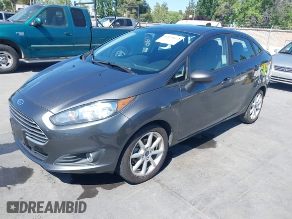 2019 Ford Fiesta SE z VIN 3FADP4BJ2KM131012, wystawiony jako IAAI lot #42228822 z przebiegiem 100 460 mil mil oraz . Historia ofert i sprzedaży dostępna na DreamBid. Obrazek 17.