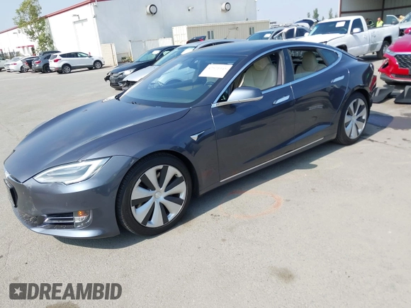 2020 Tesla Model S Long Range with VIN 5YJSA1E24LF415849, listed as a IAAI auction lot 42571945 with 34,398 mi miles and . Bid and sale history available at DreamBid. Image 18.