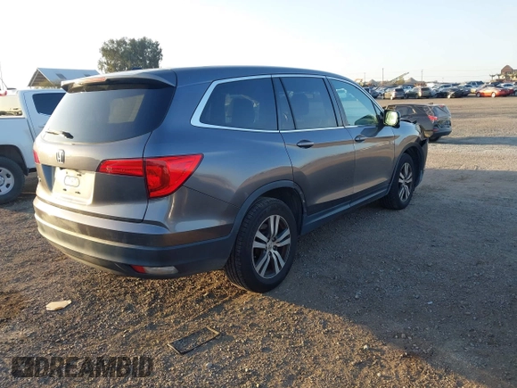 2017 Honda Pilot EX-L with VIN 5FNYF5H74HB010026, listed as a IAAI auction lot 41633770 with 170,383 mi miles and . Bid and sale history available at DreamBid. Image 4.