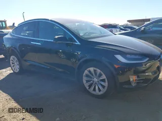 2019 Tesla Model X 75D with VIN 5YJXCDE2XKF161371, listed as a IAAI auction lot 41174741 with 34,979 mi miles. Bid and sale history available at carsss.com. Image 1.