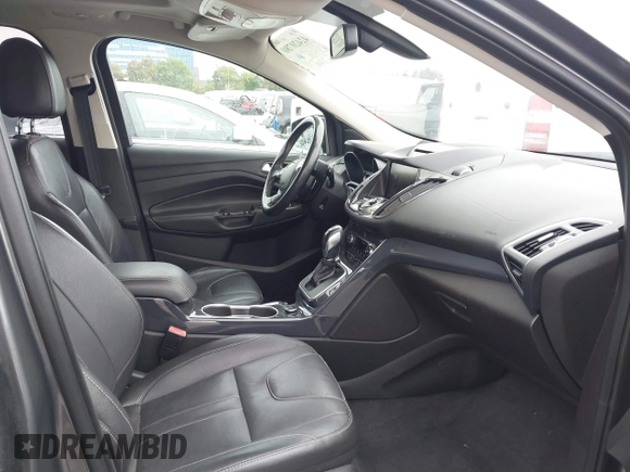 2013 Ford Escape Titanium with VIN 1FMCU0J9XDUD86354, listed as a IAAI auction lot 42420780 with 260,995 mi miles and . Bid and sale history available at DreamBid. Image 5.