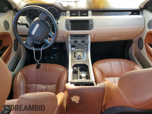 2015 Land Rover Range Rover Evoque Prestige z VIN SALVV2BG2FH012781, wystawiony jako Copart lot #57328405 z przebiegiem Nie podano mil oraz Szkoda całkowita • Salvage title. Historia ofert i sprzedaży dostępna na DreamBid. Obrazek 8.