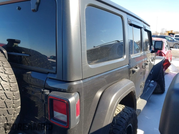 2018 Jeep Wrangler Unlimited Sport z VIN 1C4HJXDN9JW231587, wystawiony jako IAAI lot #41564880 z przebiegiem 129 003 mil mil oraz . Historia ofert i sprzedaży dostępna na DreamBid. Obrazek 13.