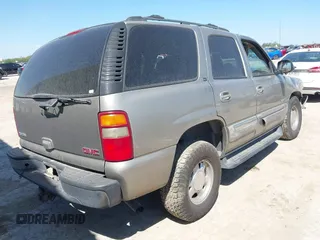 2003 GMC Yukon SLT z VIN 1GKEC13T73R169865, wystawiony jako IAAI lot #42238716 z przebiegiem Nie podano mil oraz . Historia ofert i sprzedaży dostępna na DreamBid. Obrazek 4.