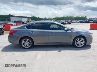2016 Nissan Altima SL z VIN 1N4BL3AP9GC153052, wystawiony jako IAAI lot #42146199 z przebiegiem 63 793 mil mil oraz . Historia ofert i sprzedaży dostępna na DreamBid. Obrazek 14.