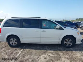 2012 Dodge Grand Caravan SXT with VIN 2C4RDGCGXCR211925, listed as a IAAI auction lot 41915648 with 150,885 mi miles. Bid and sale history available at carsss.com. Image 13.
