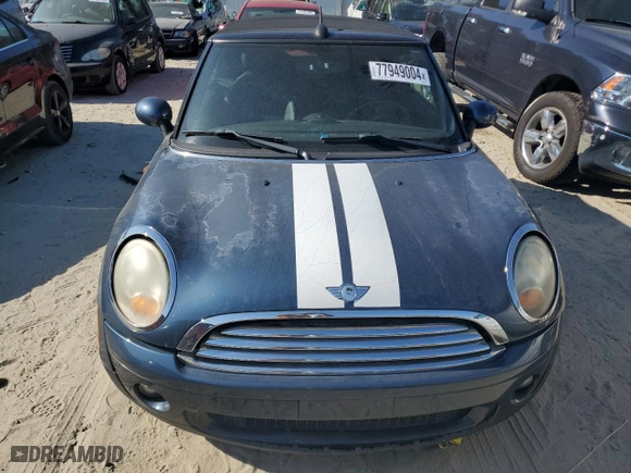 2009 MINI Cooper Convertible with VIN WMWMR33559TU96728, listed as a Copart auction lot 77949004 with 86,084 mi miles and Clean Title. Bid and sale history available at carsss.com. Image 5.