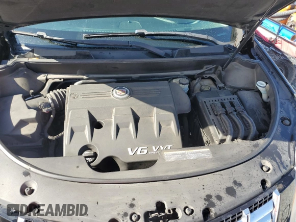 2013 Cadillac SRX Performance Collection with VIN 3GYFNHE37DS649235, listed as a Copart auction lot 56939285 with 104,692 mi miles and Salvage title. Bid and sale history available at DreamBid. Image 12.