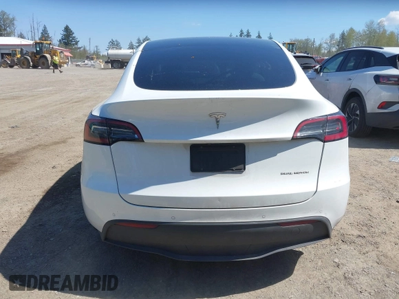 2022 Tesla Model Y Long Range z VIN 7SAYGDEE7NF418223, wystawiony jako IAAI lot #42046651 z przebiegiem 18 724 mil mil oraz . Historia ofert i sprzedaży dostępna na DreamBid. Obrazek 17.