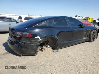 2018 Tesla Model S 75D с VIN 5YJSA1E27JF271596, выставлен на аукционе Copart как лот 57681565 с пробегом 106 710 миль миль и Списание • Salvage title. История ставок и продаж доступна на DreamBid. Изображение 3.