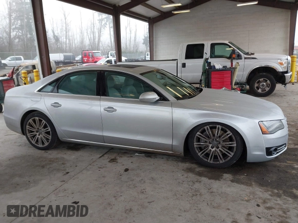 2013 Audi A8 4.0L с VIN WAUA2AFD5DN017770, выставлен на аукционе IAAI как лот 41255625 с пробегом 115 993 миль миль и . История ставок и продаж доступна на DreamBid. Изображение 13.