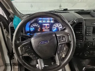 2016 Ford F-150 XLT with VIN 1FTEX1E85GFD46493, listed as a IAAI auction lot 41960577 with 153,556 mi miles. Bid and sale history available at carsss.com. Image 1.