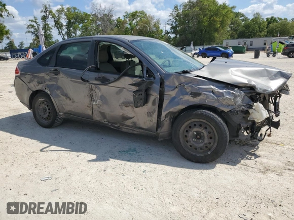 2009 Ford Focus S with VIN 1FAHP34N79W178011, listed as a Copart auction lot 51120195 with 123,930 mi miles and Salvage Title. Bid and sale history available at carsss.com. Image 4.