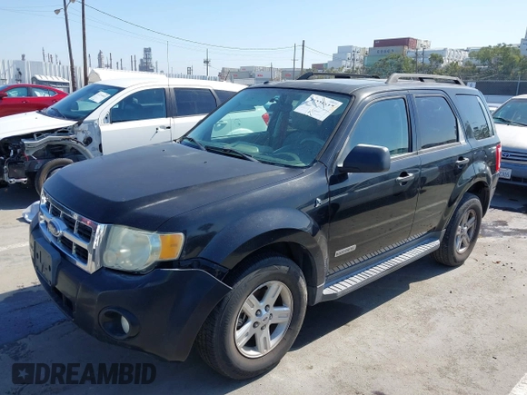2008 Ford Escape Hybrid z VIN 1FMCU49H38KB35597, wystawiony jako IAAI lot #42225617 z przebiegiem 82 171 mil mil oraz . Historia ofert i sprzedaży dostępna na DreamBid. Obrazek 2.