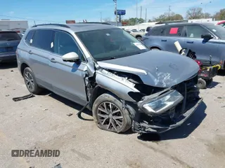 2019 Volkswagen Tiguan SE with VIN 3VV3B7AX5KM195140, listed as a IAAI auction lot 41803748 with 116,898 mi miles and . Bid and sale history available at DreamBid. Image 1.