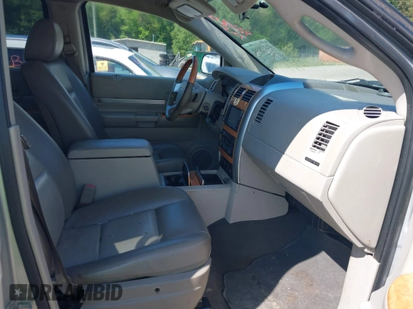 2008 Chrysler Aspen Limited with VIN 1A8HX58N38F114703, listed as a IAAI auction lot 42208555 with 255,050 mi miles and . Bid and sale history available at DreamBid. Image 5.