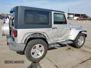 2009 Jeep Wrangler Sahara z VIN 1J4FA54169L780809, wystawiony jako Copart lot #50598925 z przebiegiem 121 078 mil mil oraz Szkoda całkowita • Salvage title. Historia ofert i sprzedaży dostępna na DreamBid. Obrazek 3.